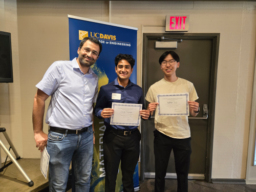 Amir Saeidi presents Senior Design Award to Vikram Gopalan and Nathan Tsui